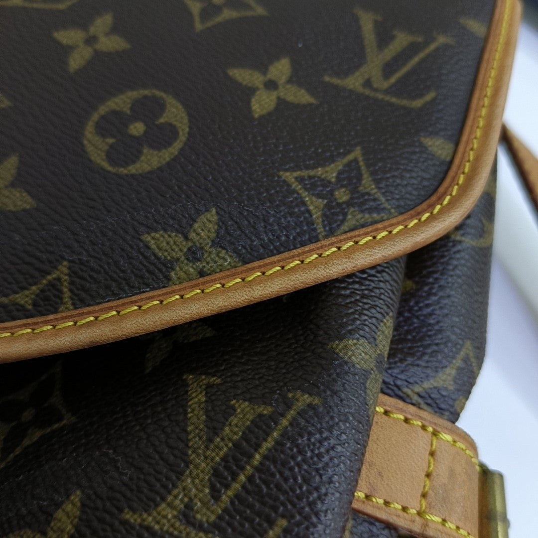 SAUMUR 30 Monogram Coated Canvas Brown