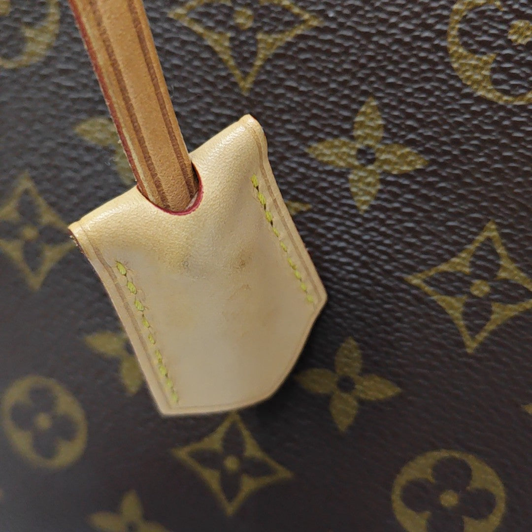 MONTAIGNE Monogram Coated Canvas Brown