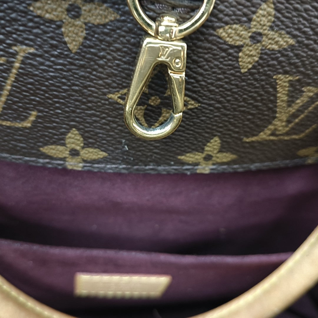MONTAIGNE GM Monogram Coated Canvas Brown