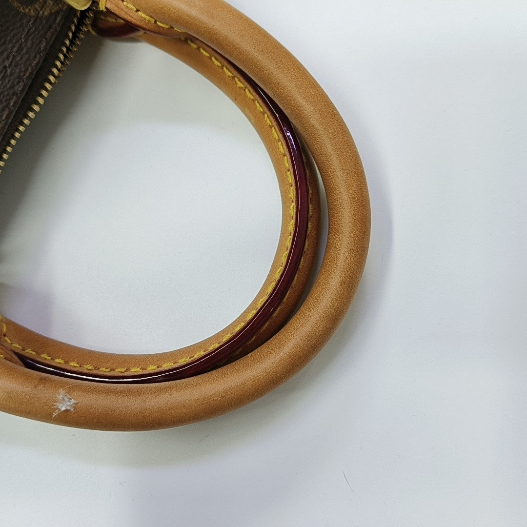 SPEEDY 25 Monogram Coated Canvas Brown