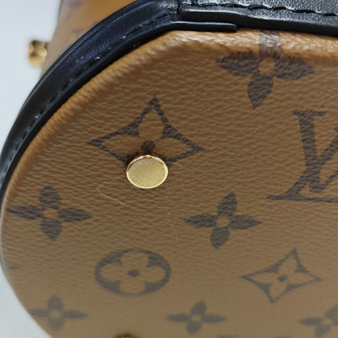 CANNES PM Monogram Coated Canvas Brown