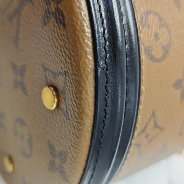 CANNES PM Monogram Coated Canvas Brown