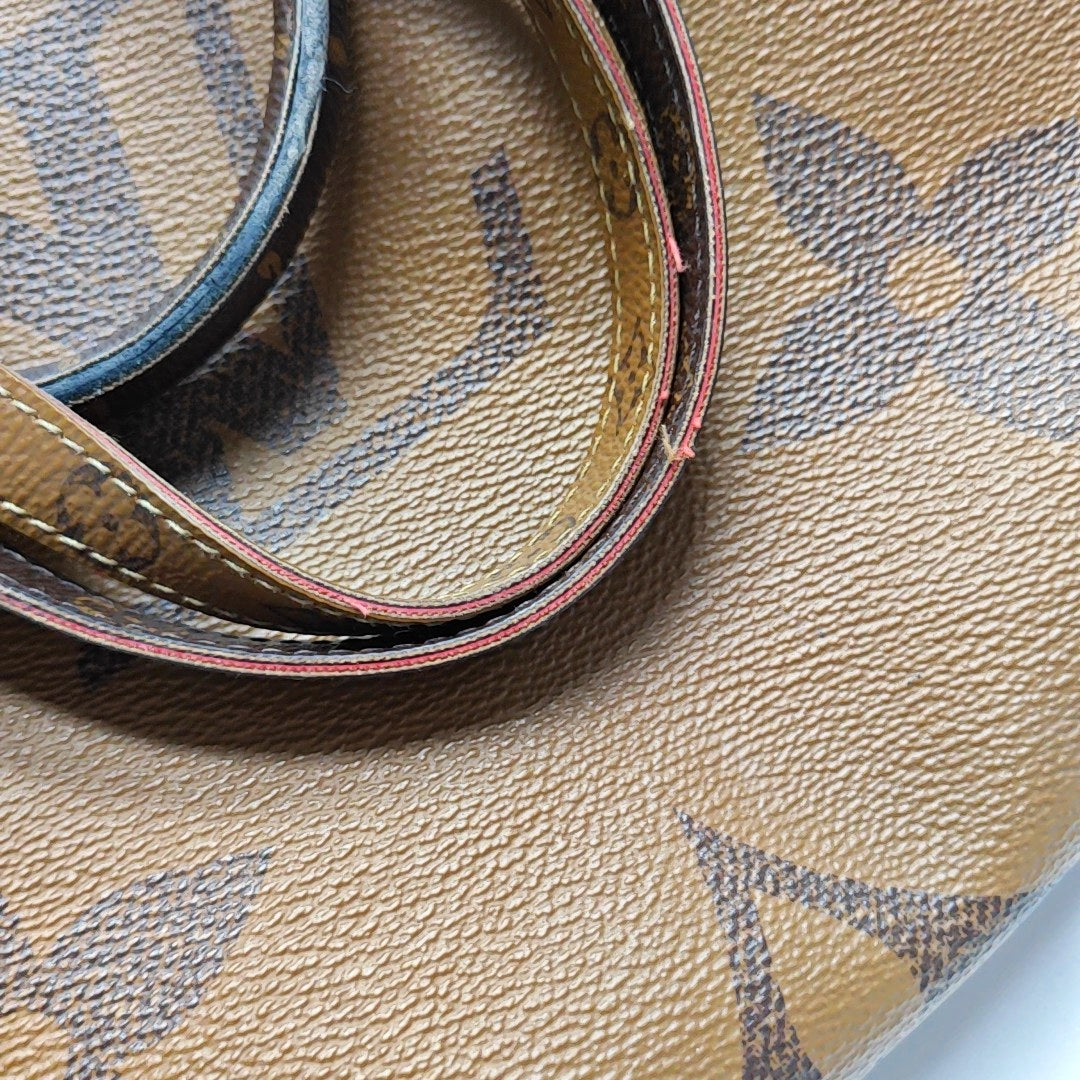 ONTHEGO MM Monogram Coated Canvas Brown