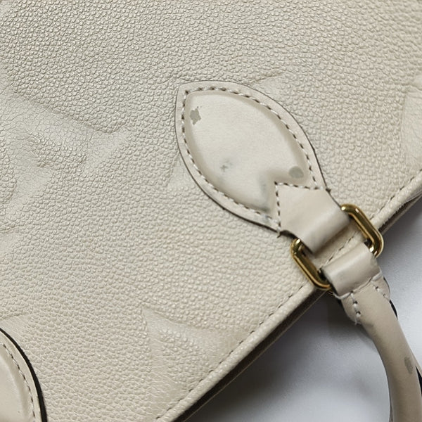 ONTHEGO PM Monogram Calfskin Beige