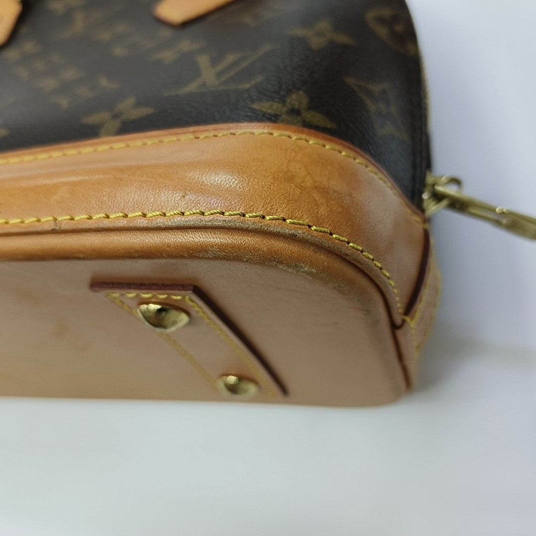 ALMA BB Monogram Coated Canvas Brown