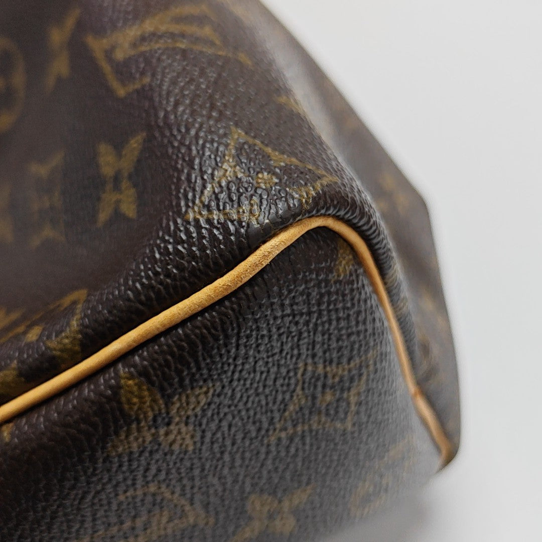 SPEEDY 25 Monogram Coated Canvas Brown