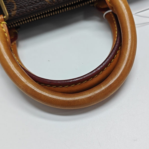 SPEEDY 25 Monogram Coated Canvas Brown
