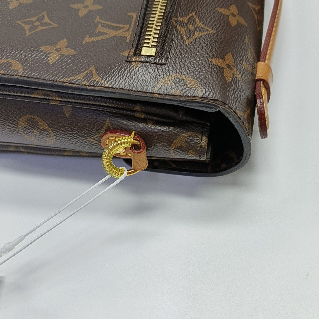 MÉTIS MM Monogram Coated Canvas Brown