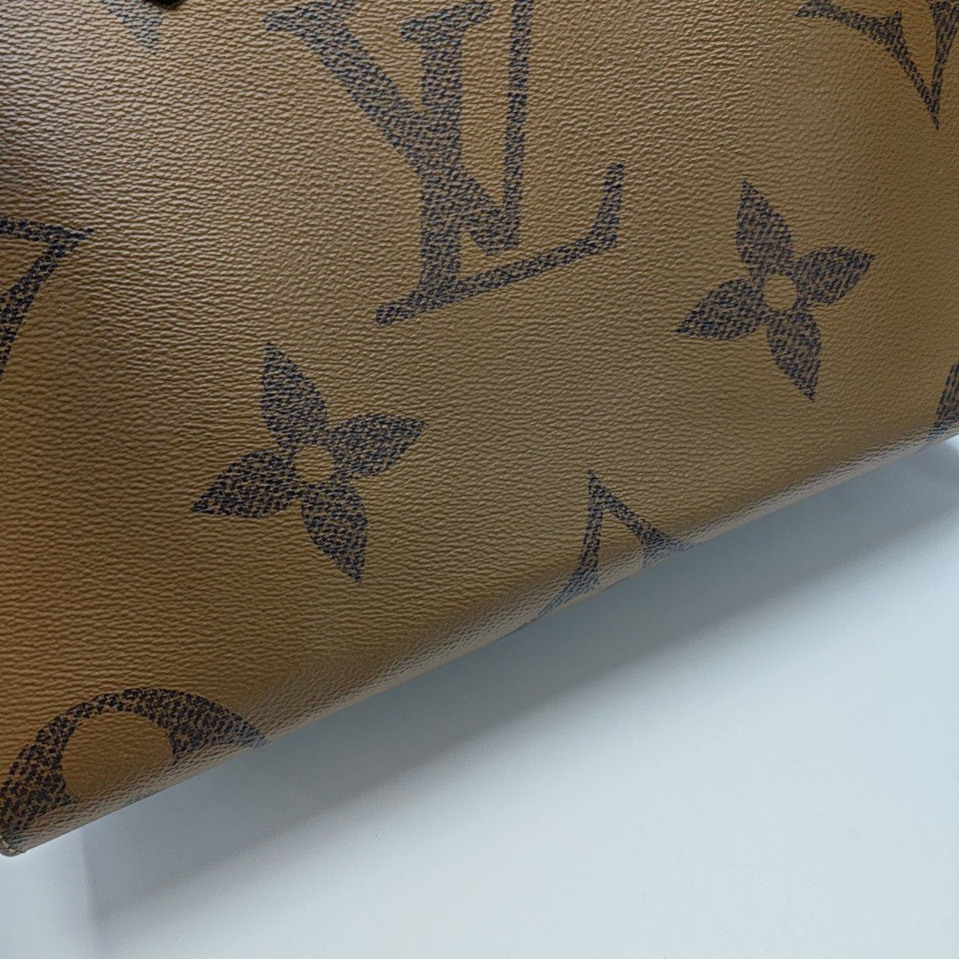 ONTHEGO MM Monogram Coated Canvas Brown