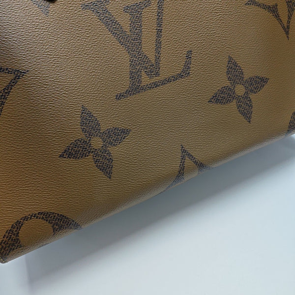 ONTHEGO MM Monogram Coated Canvas Brown