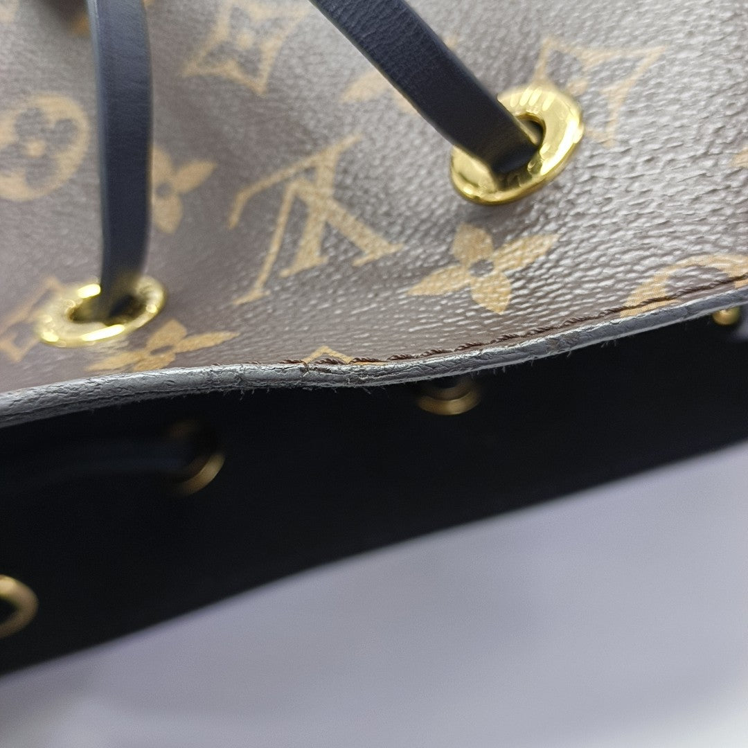NÉONOÉ MM Monogram Coated Canvas Brown