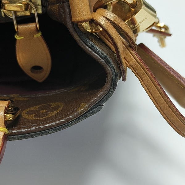 MONTAIGNE Monogram Coated Canvas Brown