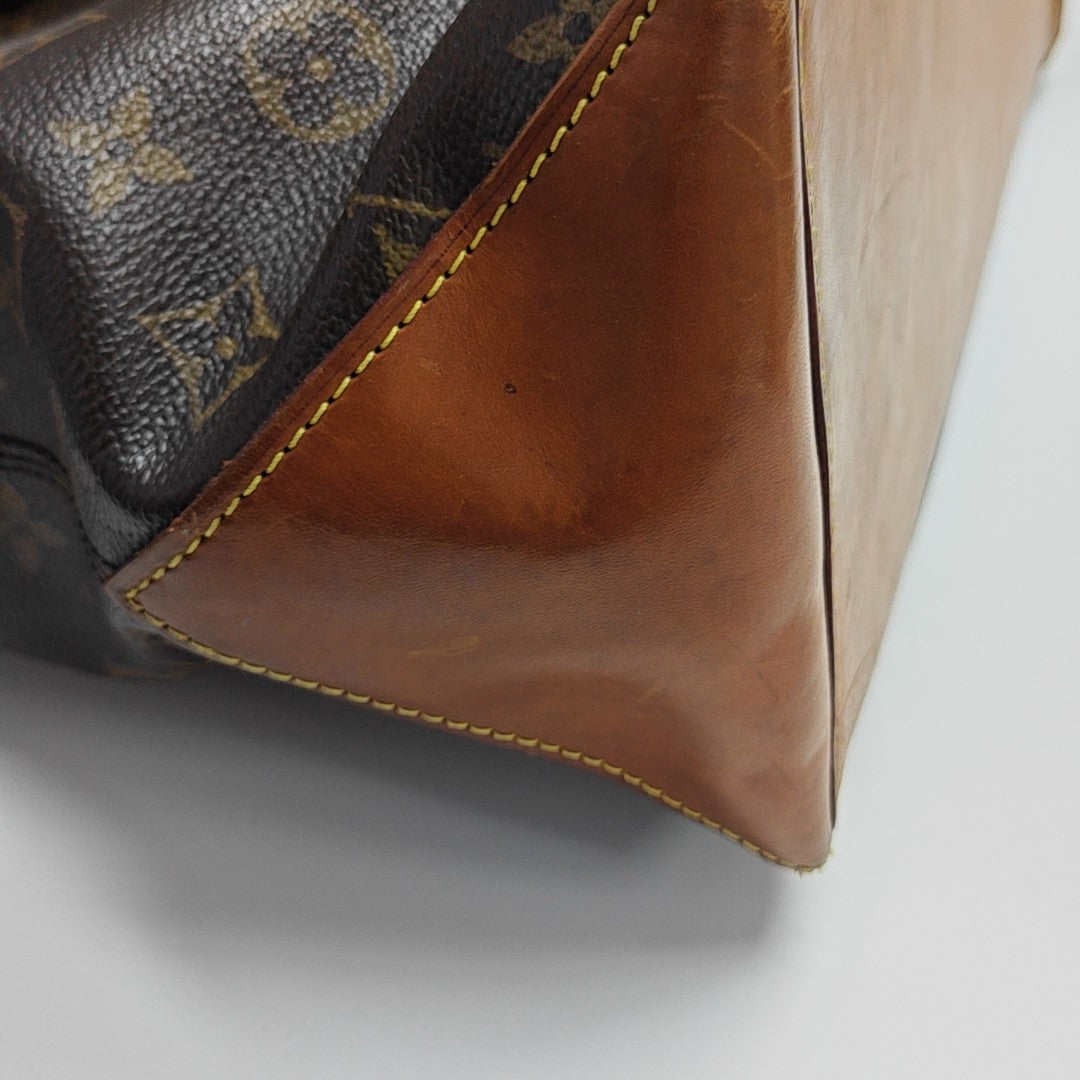 PIANO Monogram Coated Canvas Brown