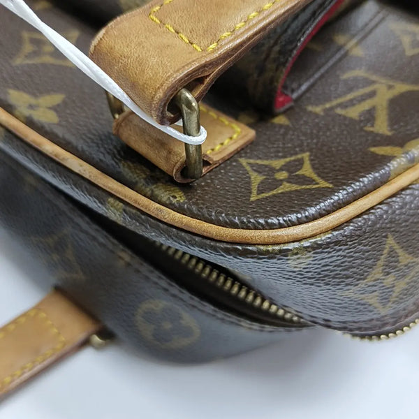 EXCENTRI-CITE Monogram Coated Canvas Brown