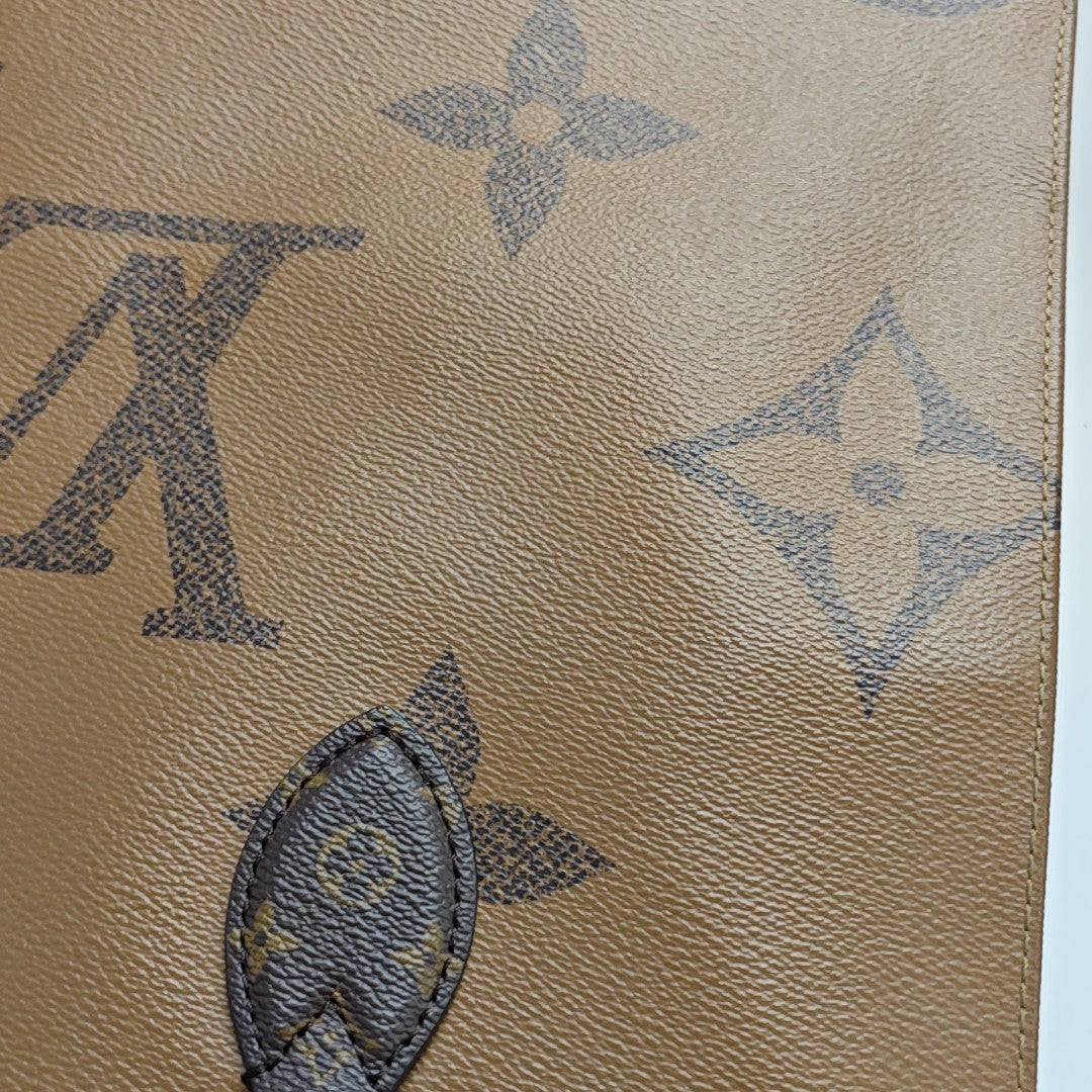 ONTHEGO MM Monogram Coated Canvas Brown