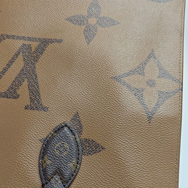 ONTHEGO MM Monogram Coated Canvas Brown
