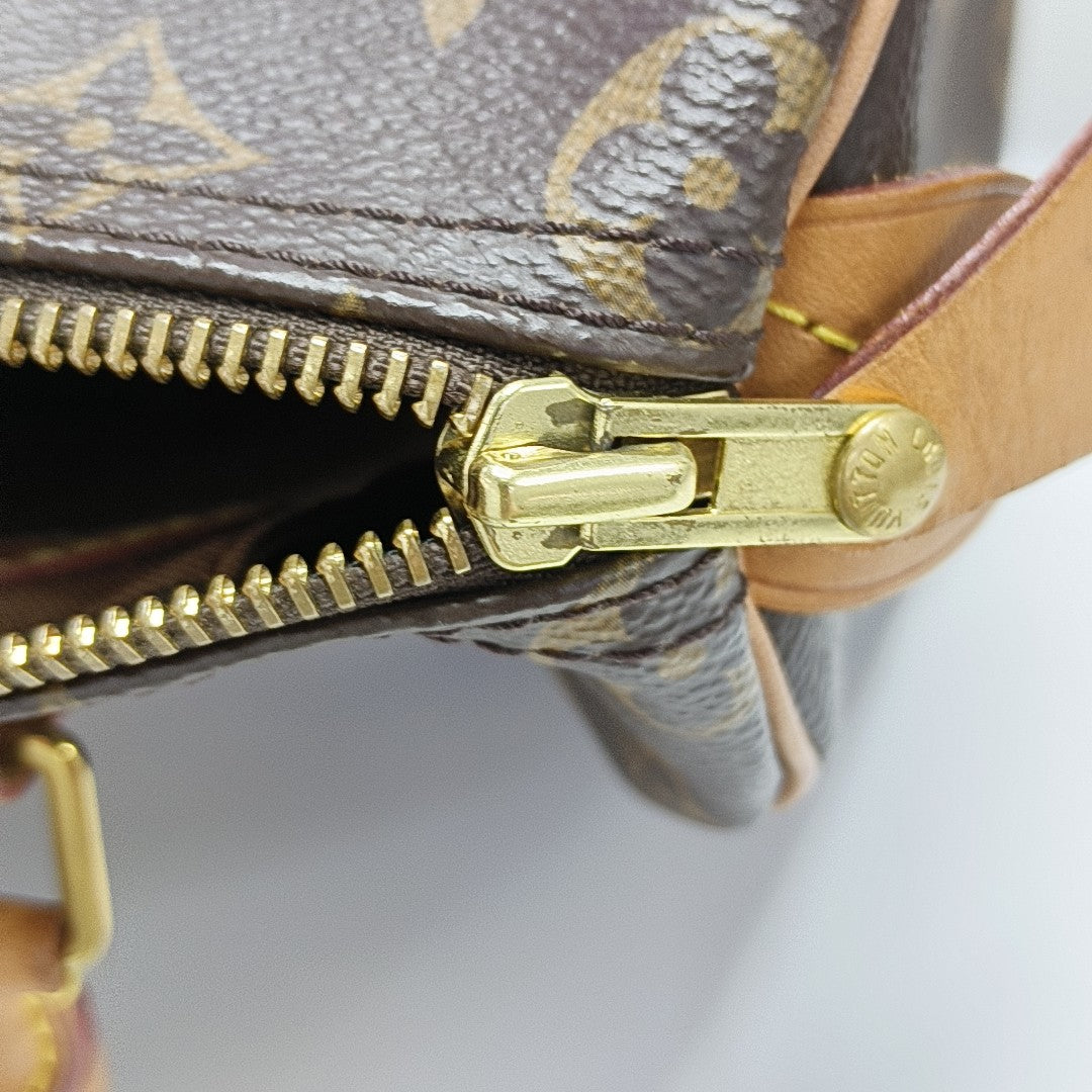 SPEEDY 25 Monogram Coated Canvas Brown