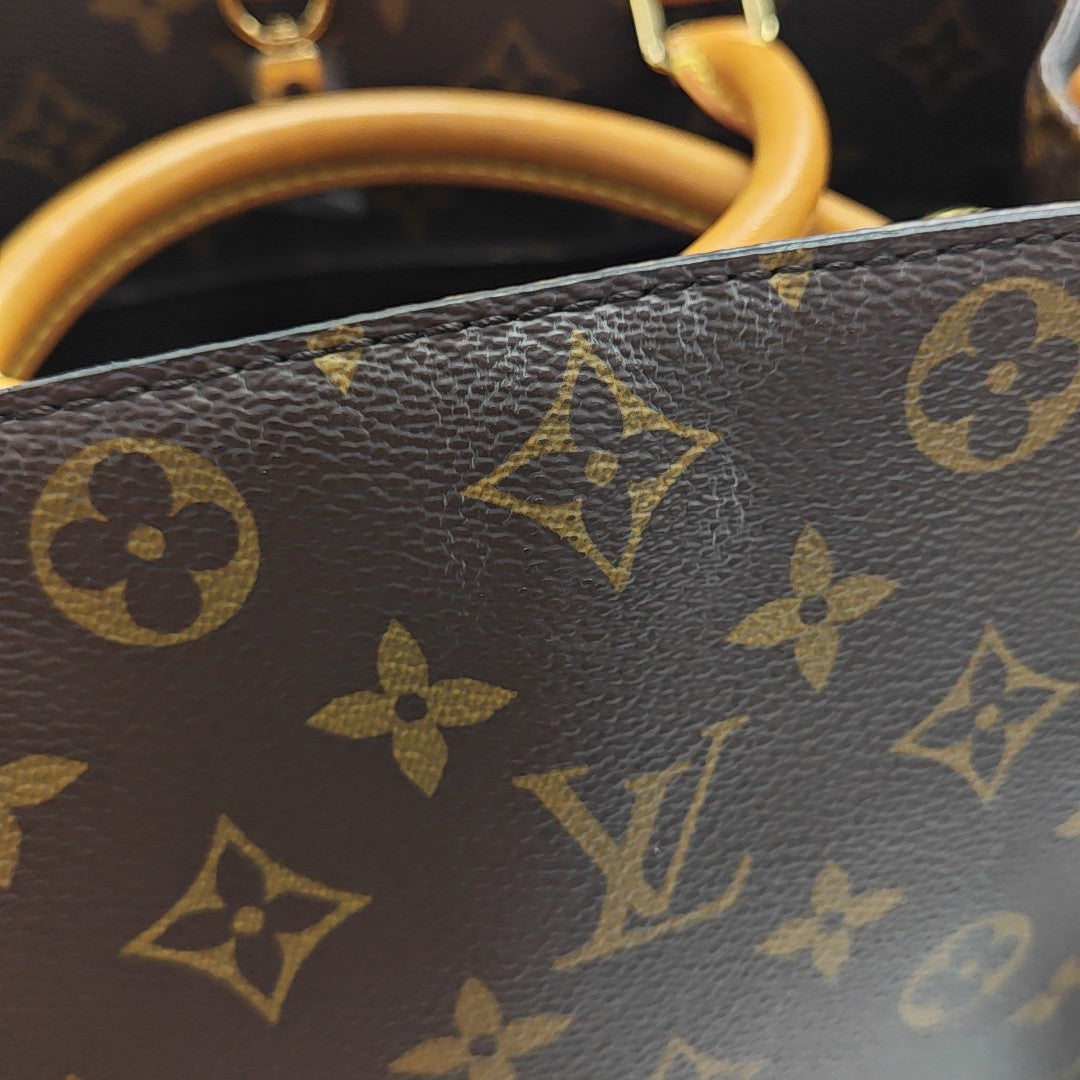MONTAIGNE MM Monogram Coated Canvas Brown