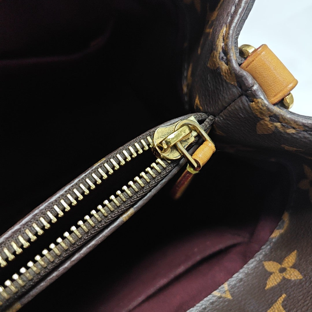 MONTAIGNE Monogram Coated Canvas Brown