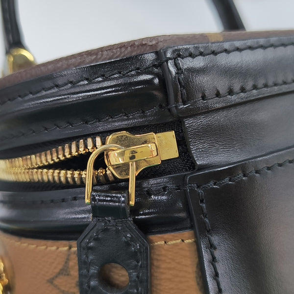 CANNES PM Monogram Coated Canvas Brown