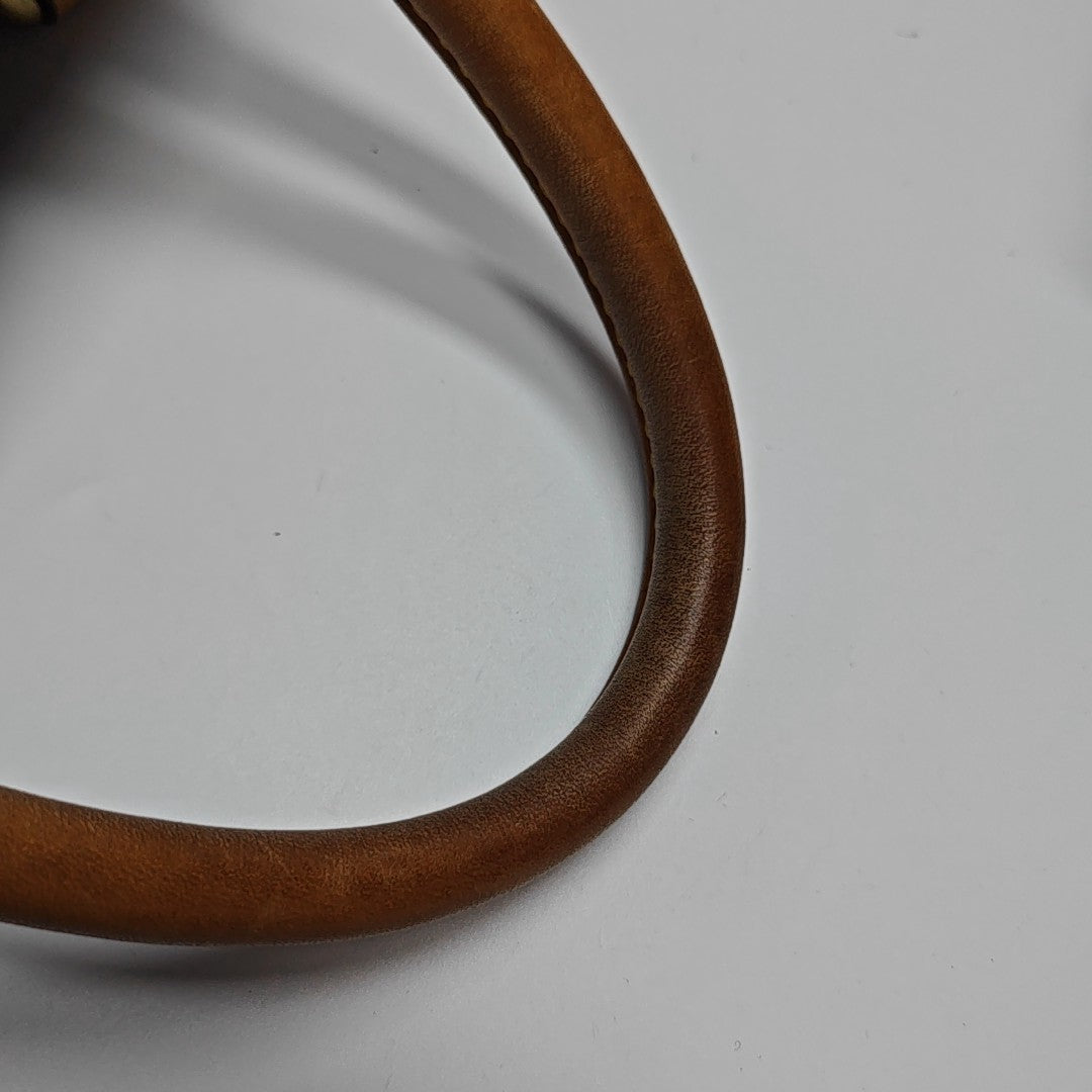 MANHATTAN PM Monogram Coated Canvas Brown