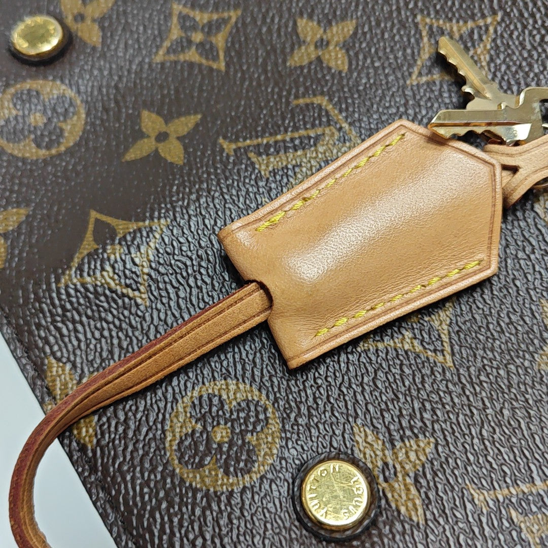 MONTAIGNE Monogram Coated Canvas Brown