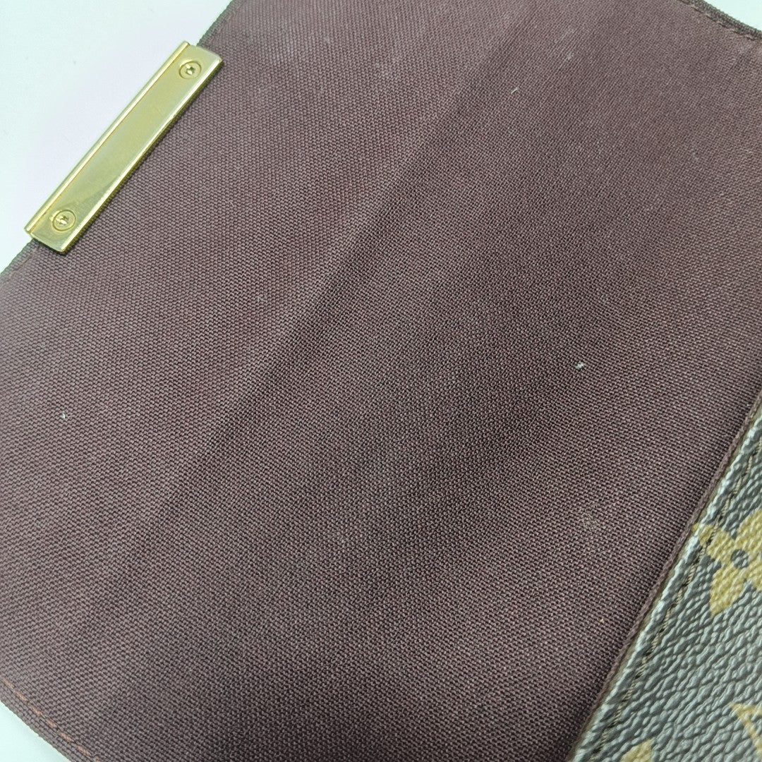 FAVORITE PM Monogram Coated Canvas Brown
