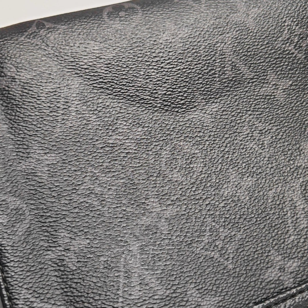 VOYAGER PM Monogram Coated Canvas Black