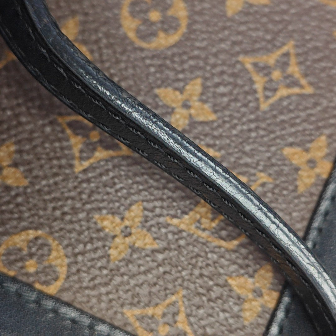 TRUNK Monogram Coated Canvas Brown