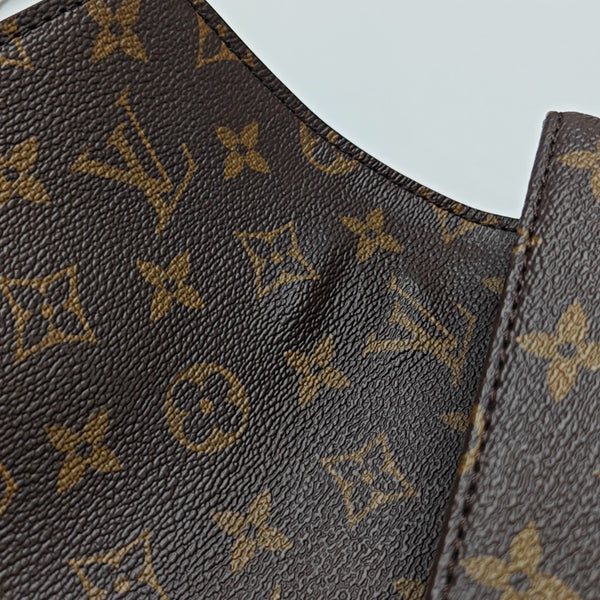 MÉTIS MM Monogram Coated Canvas Brown