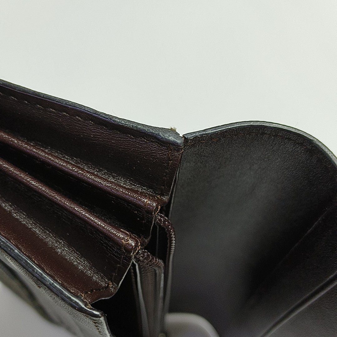 Monogram Leather Clutch Gray