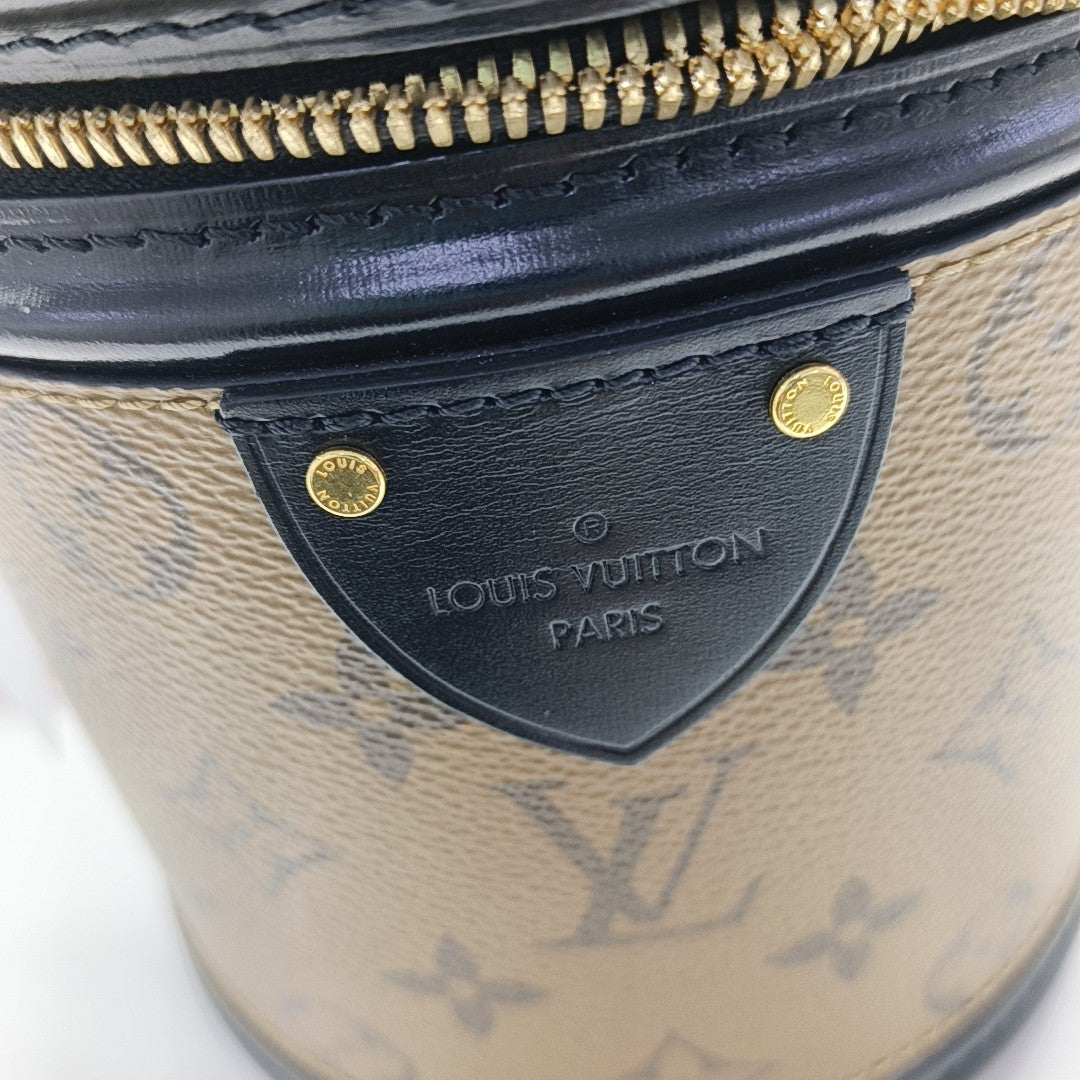 CANNES PM Monogram Coated Canvas Brown