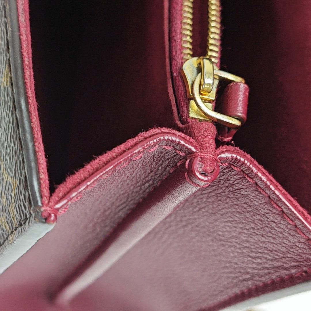 VICTOIRE Monogram Coated Canvas Brown