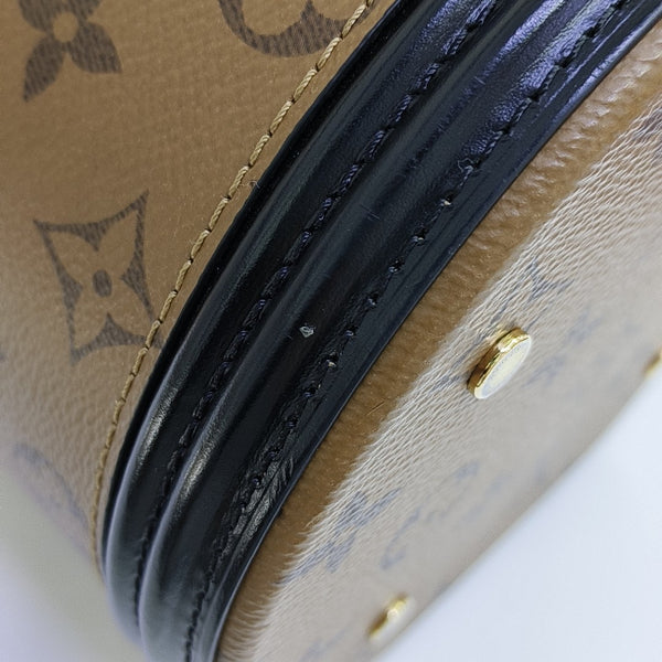 CANNES PM Monogram Coated Canvas Brown