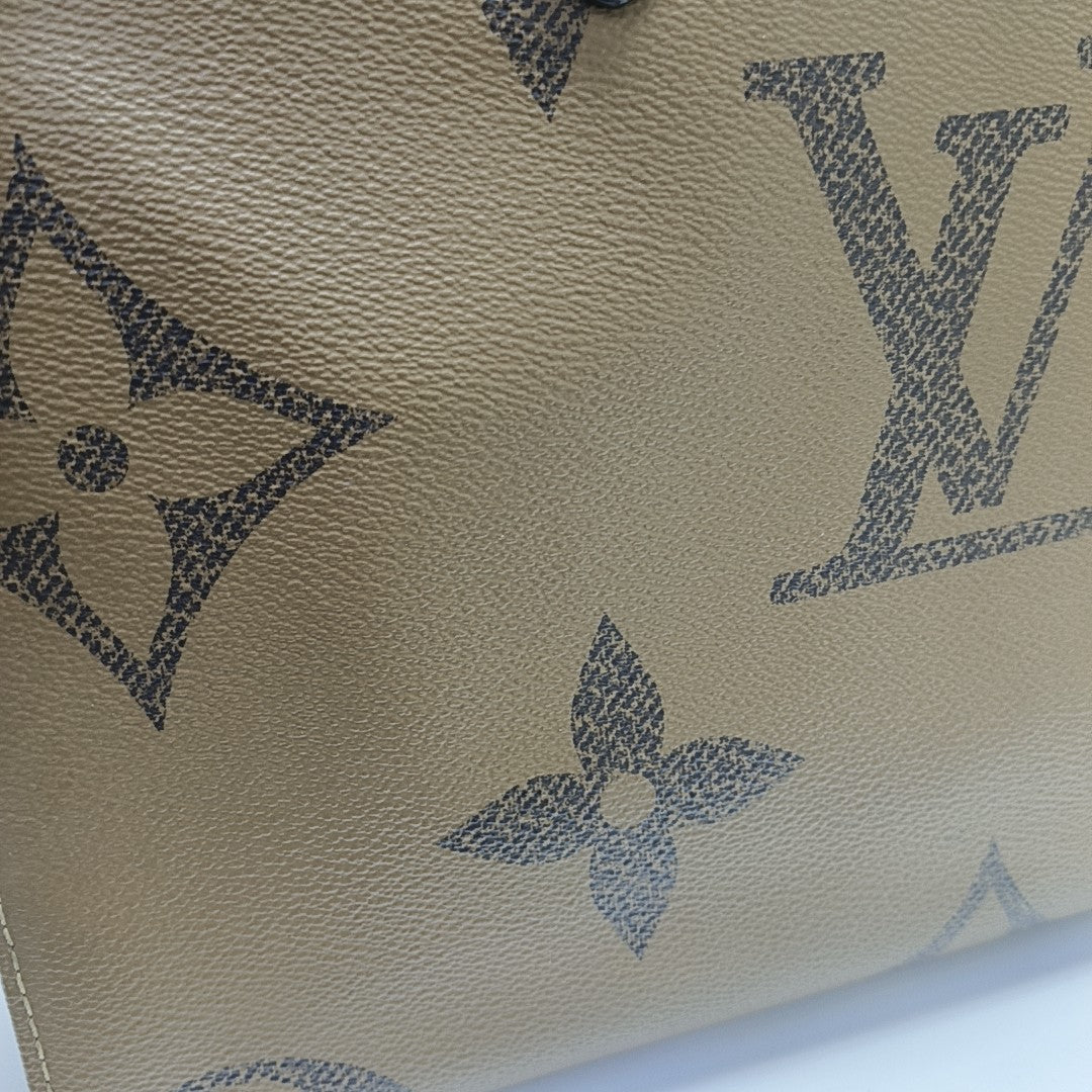 ONTHEGO MM Monogram Coated Canvas Brown