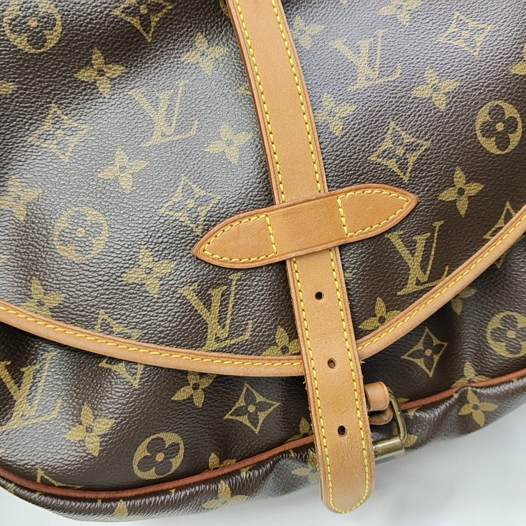 SAUMUR Monogram Coated Canvas Brown