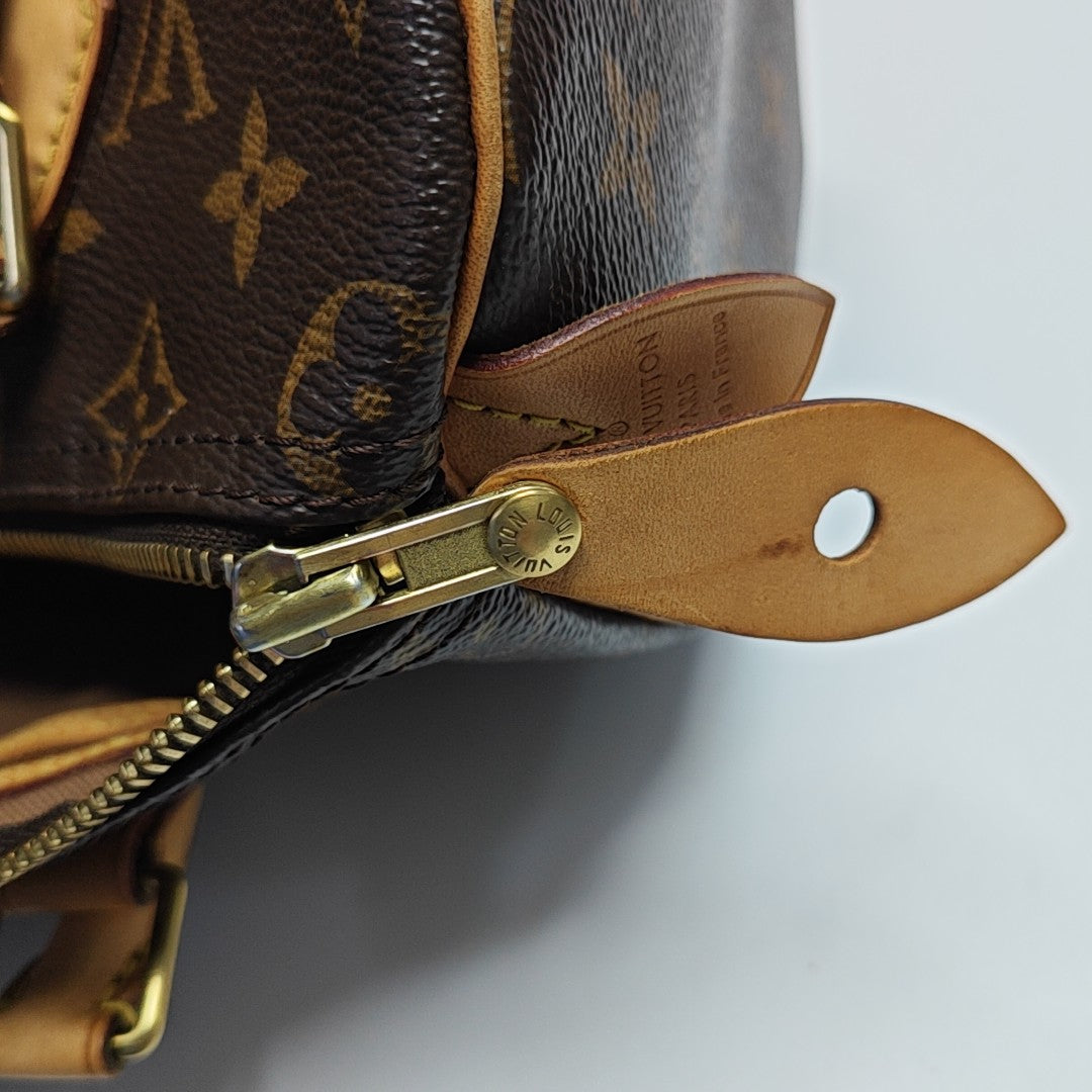 SPEEDY 25 Monogram Coated Canvas Brown
