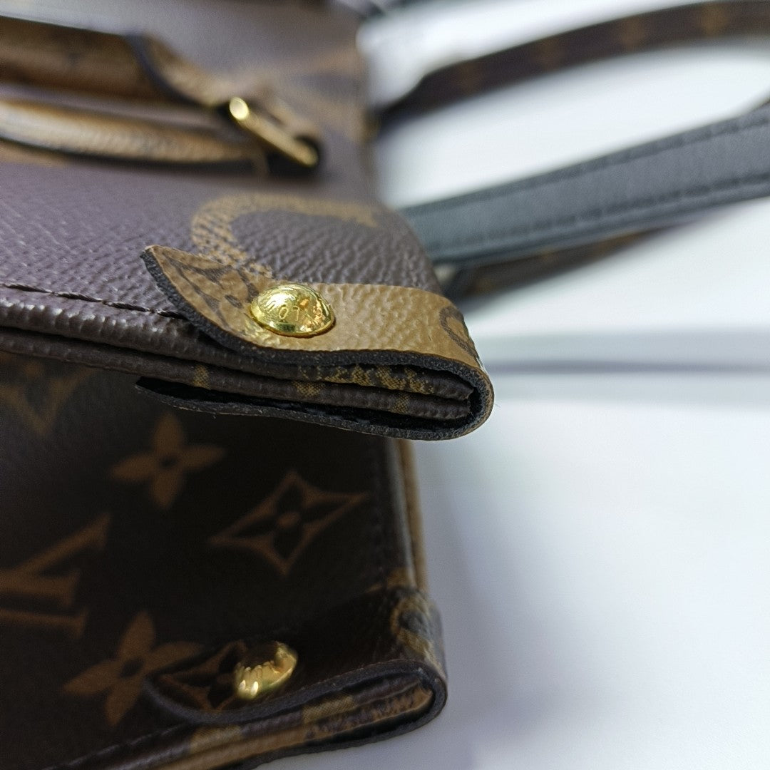 ONTHEGO MM Monogram Coated Canvas Brown