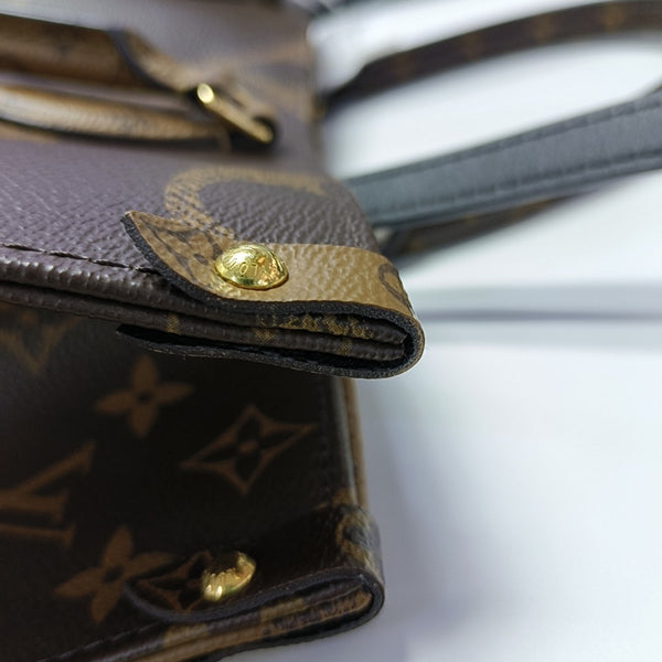 ONTHEGO MM Monogram Coated Canvas Brown