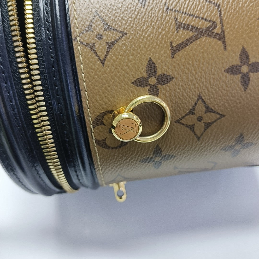 CANNES PM Monogram Coated Canvas Brown
