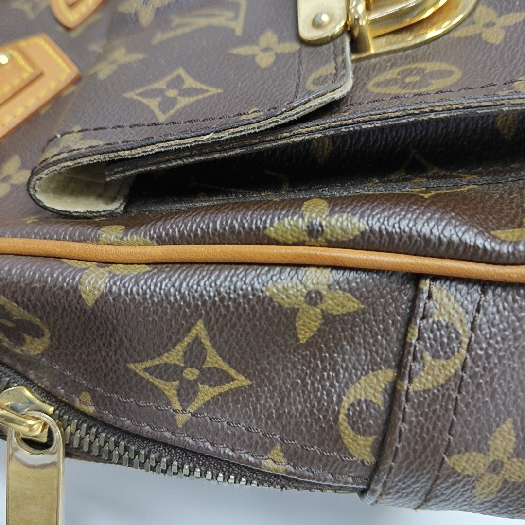 MANHATTAN GM Monogram Coated Canvas Brown