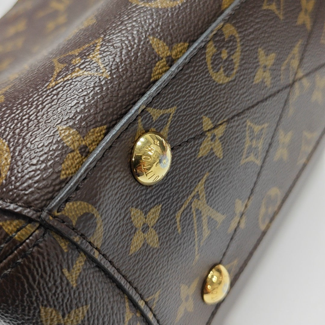MONTAIGNE BB Monogram Coated Canvas Brown