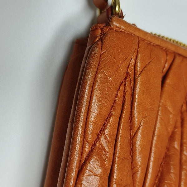 Quilted Lambskin Clutch Orange