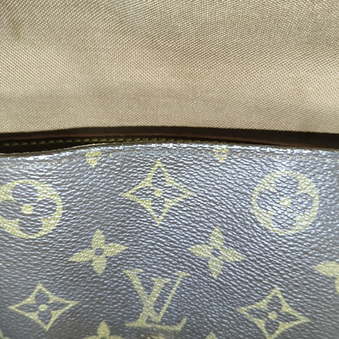 LOOPING PM Monogram Coated Canvas Brown