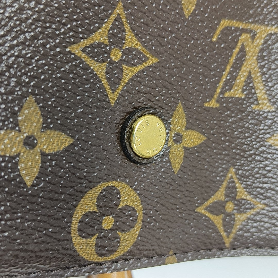 MONTAIGNE GM Monogram Coated Canvas Brown