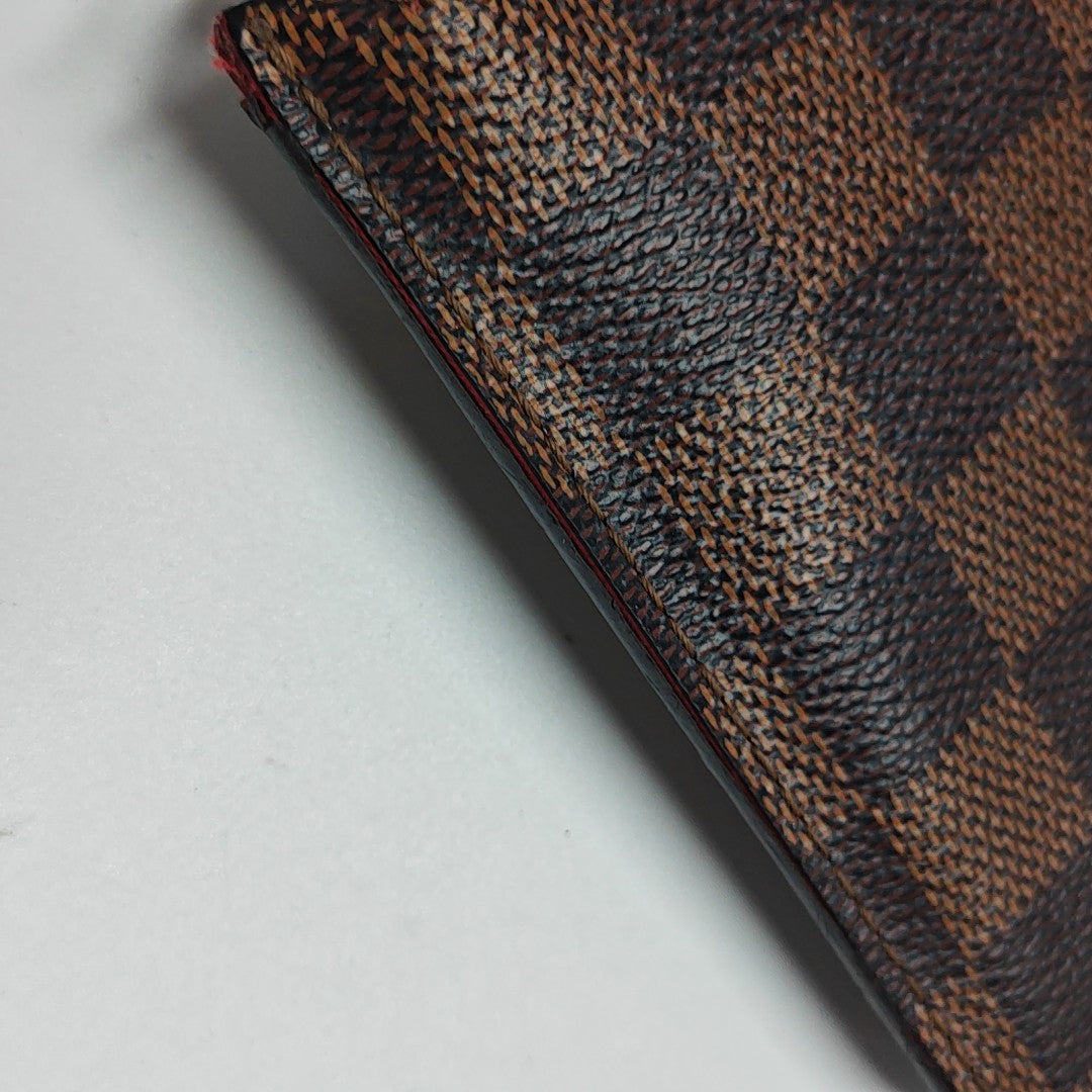 Damier Ebene Coated Canvas Clutch Brown