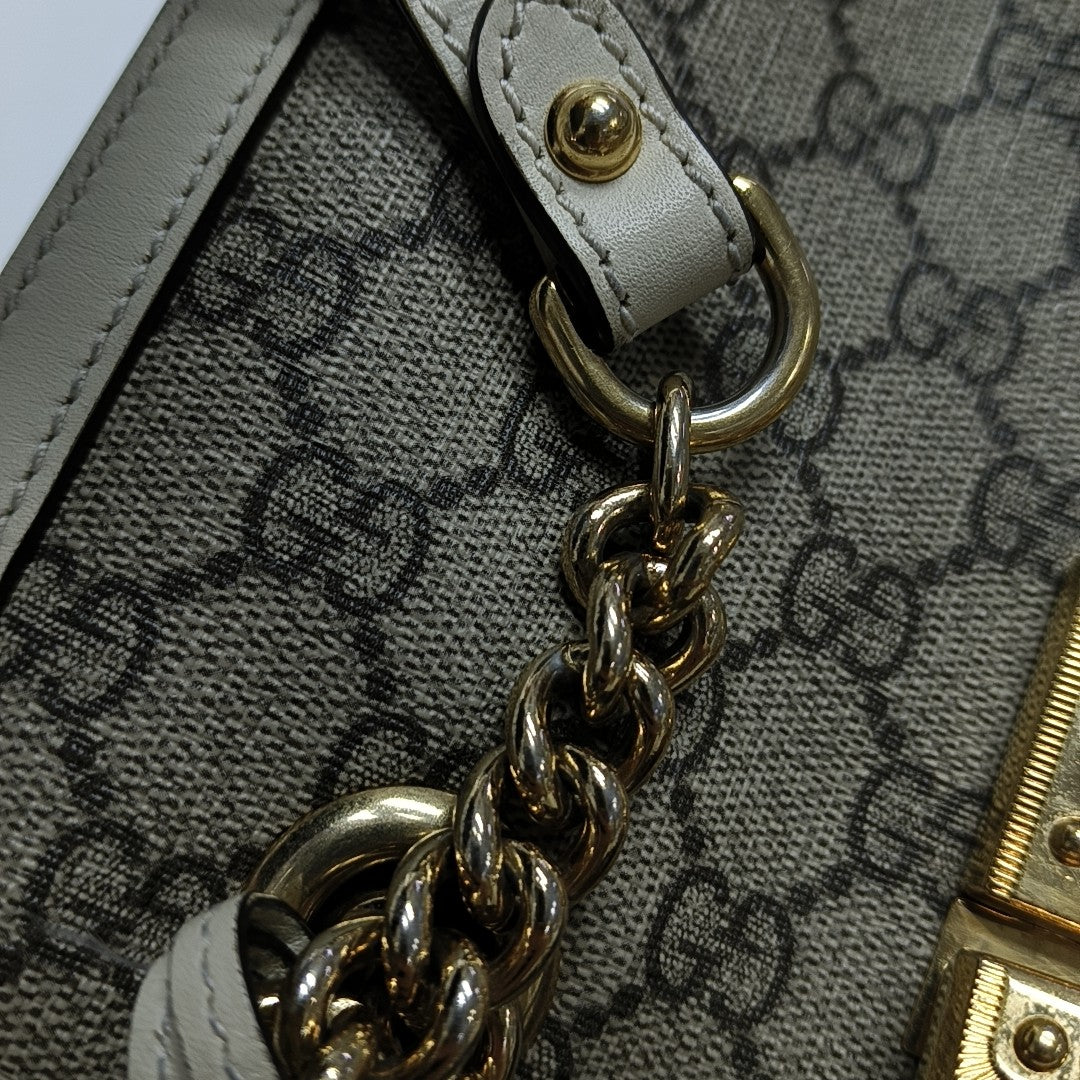 Padlock Small Monogram Coated Canvas Beige