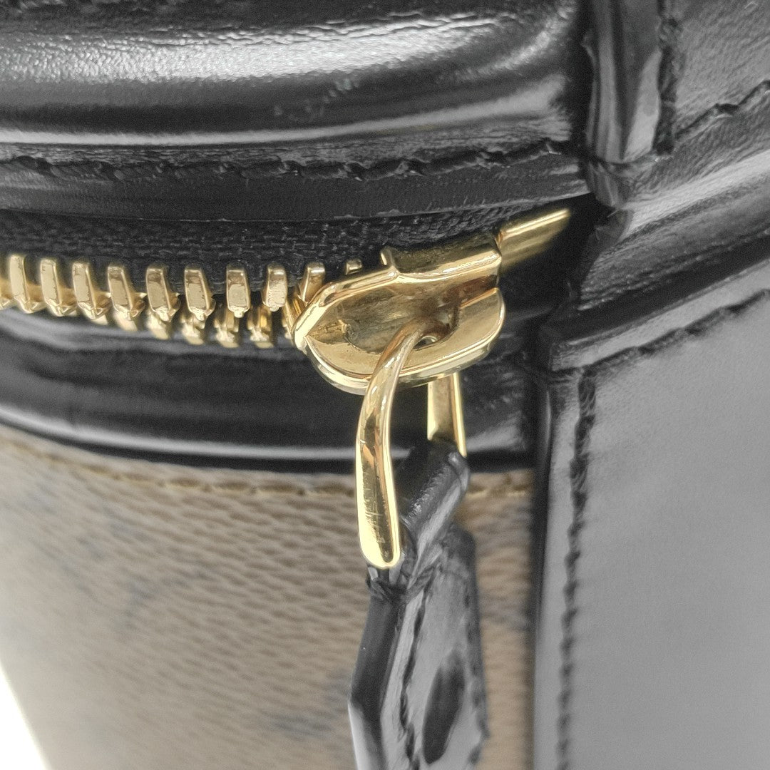 CANNES PM Monogram Coated Canvas Brown