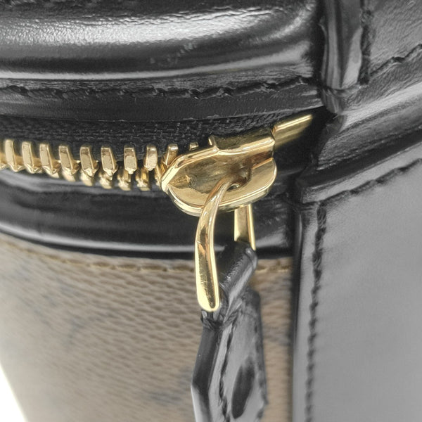 CANNES PM Monogram Coated Canvas Brown