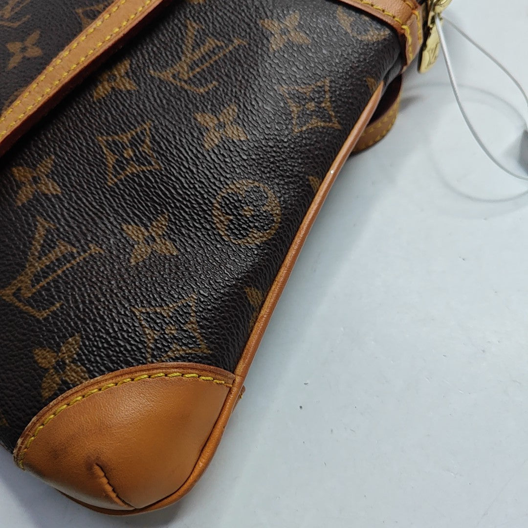 Cojín GM Lona revestida Monogram Marrón